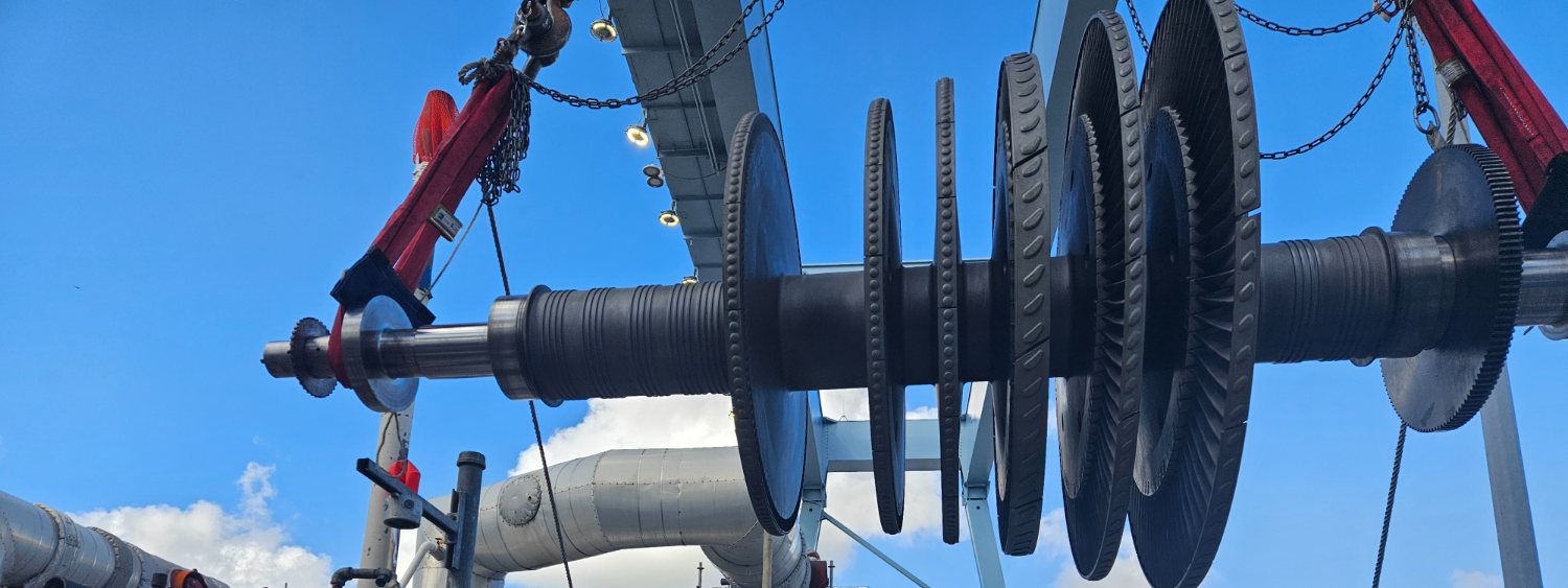 Turbine rotor suspended during rigging