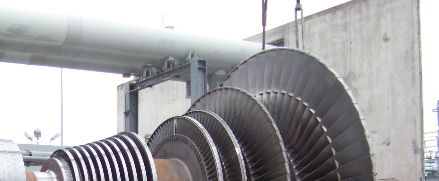 Steam turbine rotor staged on shipping frame for inspection